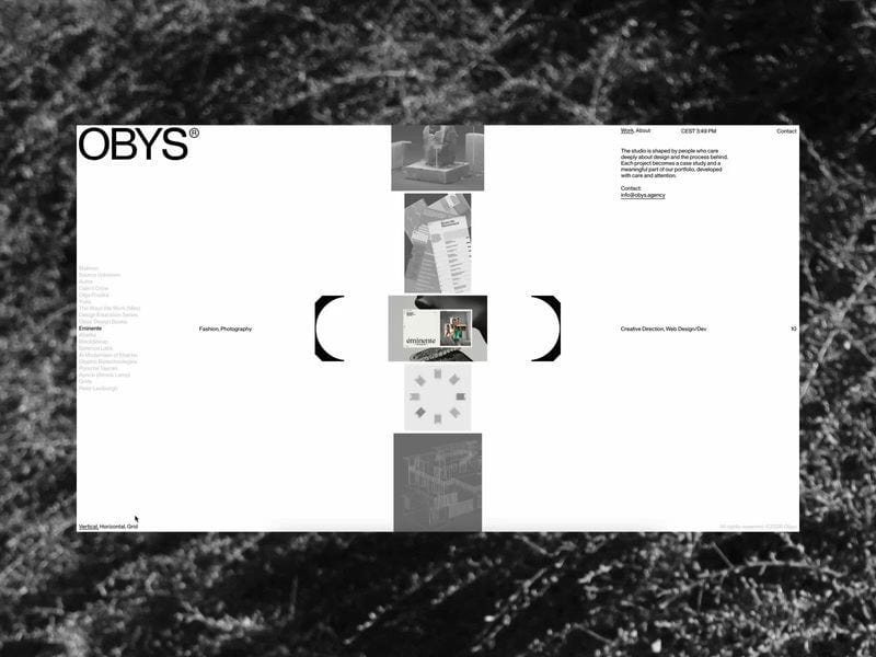 Minimal monochrome website layout by Obys featuring a centered grid of image thumbnails, surrounded by clean typography and a structured, interactive interface.