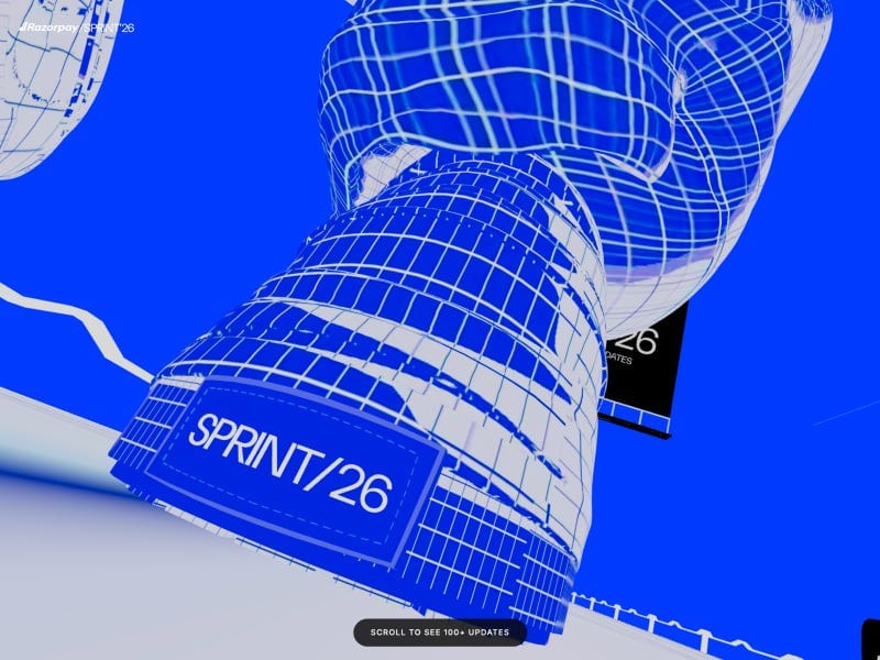 Razorpay Sprint 2026 website with bold blue 3D wireframe structures, futuristic interface, and “SPRINT/26” label in a dynamic perspective scene